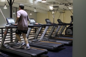 a student exercises on a treadmill